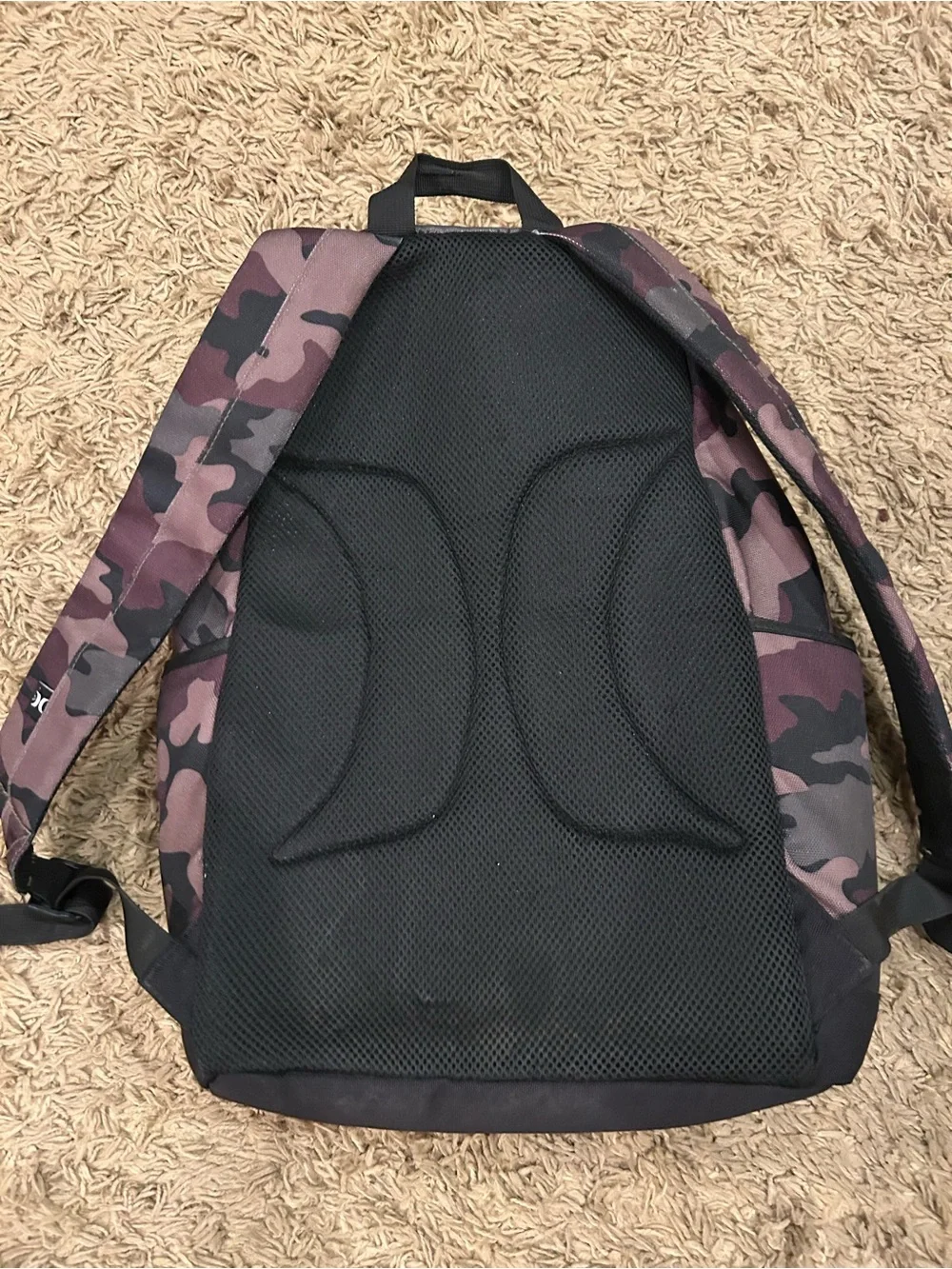 Hurley Camouflage Backpack with Orange Splash Graphic